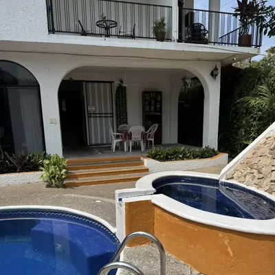 Ground-floor arches beside the pool and jacuzzi