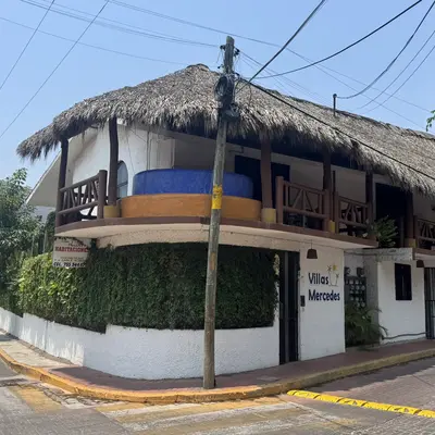 Hotel corner on Adelita Street with a palapa roof, La Madera Beach