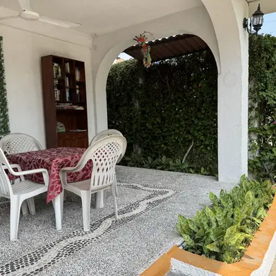 Open-air dining terrace under the arches